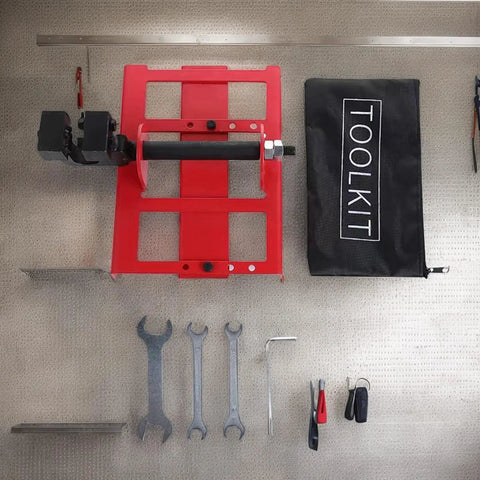 Kickass Portable Chainsaw Mill Guide Rail Positioner featuring heavy duty steel frame and toolkit for timber milling setup.