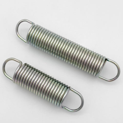 Two zinc-plated extension springs with single-loop ends; spring steel construction, lengths 2.5 in and 3.25 in.