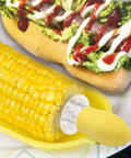 Twin Prong Corn Cob Holders And Butter Spreader Set For Barbecue displayed with corn on the cob and hot dog