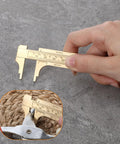 Brass Pocket Vernier Caliper Set With 3.15 Inch And 3.94 Inch Mini Sliding Calipers, hand holding tool for jewelry measurement.