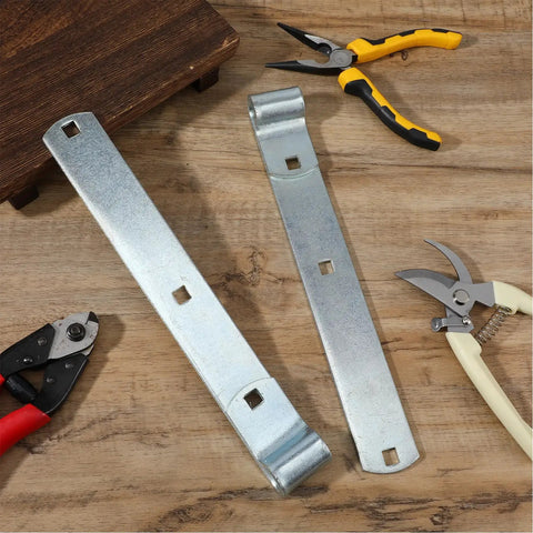 Four Pack 12 Inch Stainless Steel Strap Hinges Heavy Duty Gate Hardware For Sheds Barns And Swing Doors Silver Finish on wooden surface.