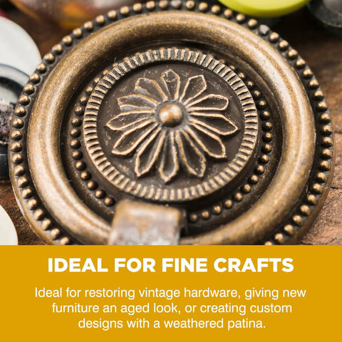 Front close-up of antique brass doorknob with floral center and beaded edge