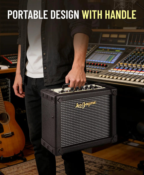 Man holding 20W Electric Guitar Amplifier With Carry Handle For Practice And Small Gigs in studio setting.