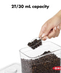 Clear Coffee Scoop For POP Storage Containers, 2 Tbsp 30 mL Capacity, scooping beans from a container