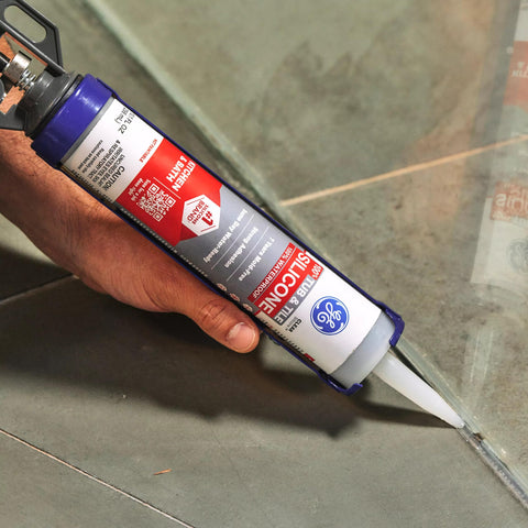 Applying Silicone Caulk For Tub And Tile Kitchen And Bath Clear Sealant 100 Percent Waterproof Flexible Adhesion Shrink And Crack Proof Ideal For Bathrooms And Kitchens DIY Friendly Mildew Resistant High Flexibility 10 Fl Oz Cartridge to floor joint