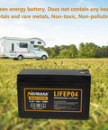 12V 10Ah LiFePO4 Deep Cycle Battery with Built In 10A BMS for solar off-grid lighting in front of an RV on grass