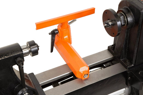 WEN LA3424 benchtop wood lathe with orange tool rest on black bed