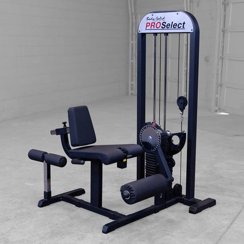 Built Tough Leg Extension And Curl Machine With A Massive 310 Lb Weight Stack Designed For Killer Leg Day Gains Serious Strength Building And Home Gym Flexes, black steel, adjustable seat.