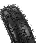 Close-up of the tread pattern on a 4.10/3.50-6 Inner Tube With TR87 Bent Valve Stem For Go Karts and similar vehicles.