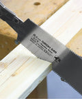 Close-up of pull saw cutting wood, from Beginner Friendly Japanese Woodworking Hand Tool Set 7 Piece Includes Plane Chisels Pull Saw Hammer Marking Gauge And Carry Bag All In One Starter Kit Made In Japan For DIY Woodworking Fans.