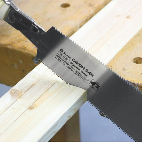 Close-up of pull saw cutting wood, from Beginner Friendly Japanese Woodworking Hand Tool Set 7 Piece Includes Plane Chisels Pull Saw Hammer Marking Gauge And Carry Bag All In One Starter Kit Made In Japan For DIY Woodworking Fans.