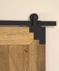 Rustic Forged Iron Corner Bracket For Barn Door In Matte Black Finish 75 mm installed on wood door corner with mounting hardware