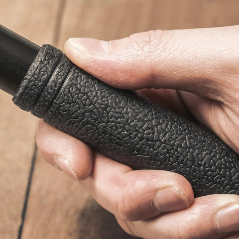 Close-up of a hand gripping the textured handle of the Internal Bottom Bracket Removal Tool For Tapered, Octalink And ISIS Splined BBs.