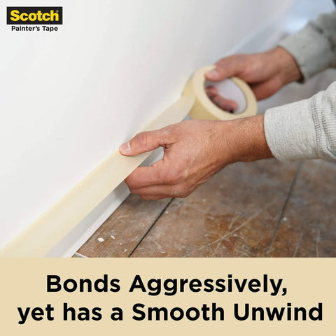 Applying Contractor Grade Masking Tape 0.94 Inch By 60.1 Yard Pack Of 36 Rolls, High Adhesion Painter Tape near floorboard