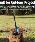 5 Lb Carbon Steel Head Mattock in trenching action with 36 Inch Dual Injected Fiberglass Handle for heavy duty yard work and landscaping.