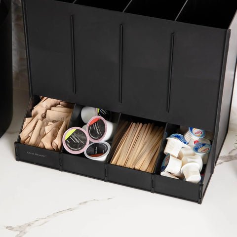 Four Compartment Coffee Pod Dispenser For Breakroom Holds Up To 120 Pods Keeps Your Coffee Station On Point Black Plastic Organizer With Easy Access Tray Measures Fourteen And A Half Inches By Nine Inches By Twelve And A Quarter Inches, displaying coffee pods, stirrers, and creamers neatly organized.