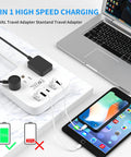 8 In 1 Travel Plug Adapter With USB C And Four USB Ports Three AC Outlets Wall Mountable next to laptop and tablet charging