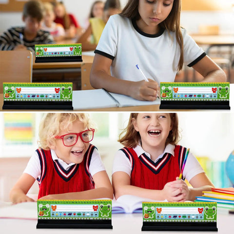 Students using 24 Pack Desk Name Plate Holders With Self-Adhesive Removable Grip And Built-In Pen Holder, Black Plastic Name Tag Displays For Classroom, School, Or Home Study, Easy Peel And Stick, 1.5 X 12 X 1 Inches in classroom setting.