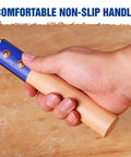 Hand gripping the wooden handle of the Heavy Duty Japanese Pull Saw For Fine Woodworking 6 Inch Dovetail Blade With 23 TPI SK5 Steel.