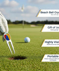 Gloved hand holding Beach Ball Crystal Golf Marker near hole on putting green, includes product features and benefits text.