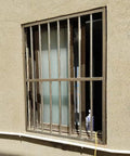 Heavy Duty 304 Stainless Steel Window Security Bars And Balustrades Rock Solid Safety Railings For Homes Decks Backyards seen on a window.