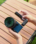 Person adjusting Street Ready S9 Hand Grip For Panasonic Lumix S9 Camera With L Shape Bracket And Built In Arca Quick Release Plate