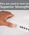 Hand inserting pin into Universal Heavy Duty Window Air Conditioner Mounting Bracket for superior strength.