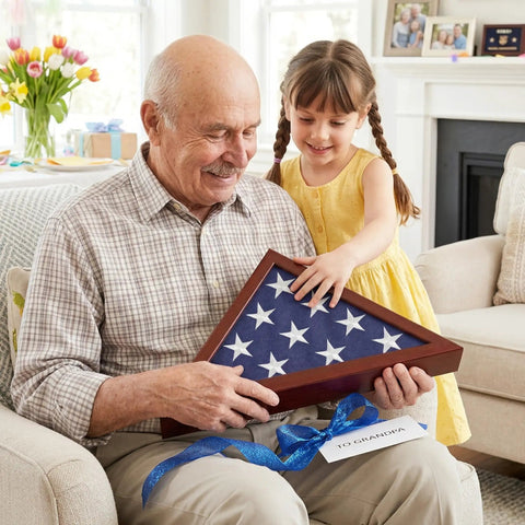 Grandfather and granddaughter holding Small Folded Flag Display Case For 3x5 Ceremonial Flags Not For Burial Flag, gift wrapped.