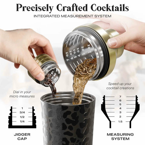 Top Shelf Insulated Cocktail Shaker Set With Double Wall Stainless Steel Body And Integrated Jigger Strainer pouring drinks with a jigger cap.