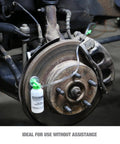 Installed view of OEMTOOLS Bleed-O-Matic One-Man Brake Bleeder Kit with clear tubing on a vehicle brake rotor