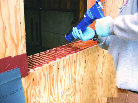 Application of FastFlash Fluid Applied Flashing Membrane For Windows Waterproof And Airtight Pro Grade Sealant on wood surface
