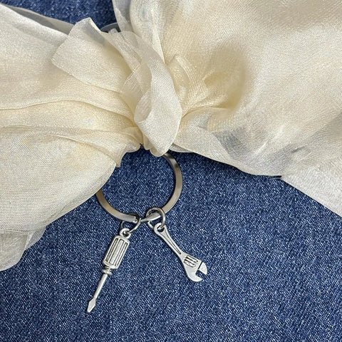 Thats What I Do I Fix Stuff And I Know Things Mechanic Keychain Gift on fabric, includes screwdriver and wrench charms