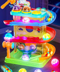 Two In One Rolling Ball And Car Ramp Race Track For Toddlers With Sensor Lights And Light Up Balls And Mini Cars A Totally Fun Montessori STEM Playset For Kids Ages 1 To 5, showing colorful spiral ramps and light-up balls.