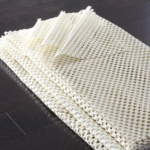 Folded non slip rug pad under carpet that keeps it stuck to all hard floors, grippy anti slip runner mat stays put, cushioned durable floor protector for 12 ft runner