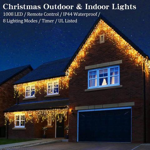 Outdoor Icicle Christmas Lights With 1008 LEDs, 98.4 Ft warm white drops on house eaves, night view.