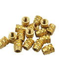 Heavy Duty 6 32 Threaded Heat Set Inserts For 3D Printing Solid Gold Brass Screws scattered on a white background.