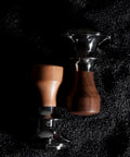 Adjustable Stainless Steel Coffee Tamper With Solid Flat Bottom Base Pro Level Espresso Tool For Home Baristas No Gimmicks Gray Finish, two styles on dark background.