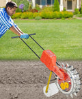 Person using Back-Friendly Garden Seeder Row Planter Hand Push Seeder With 16 Holes Walk Behind Row Crop Planter in garden.
