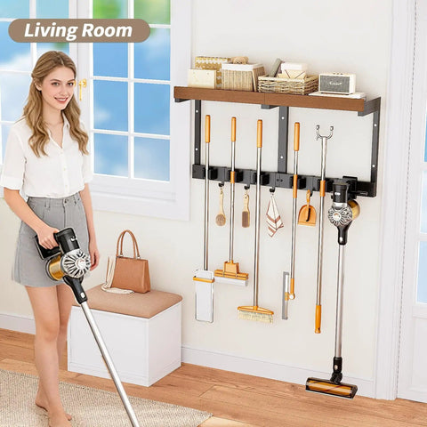 Space Saving Wall Mount Broom Holder With Cleaning Supplies Organizer, Mop Rack, Vacuum Organizer And Shelf installed in living room.