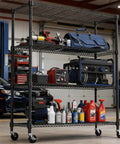 Heavy Duty 4 Tier Metal Storage Shelving Unit With Wheels For Garage Pantry Kitchen Basement Black, 1400 Lbs Total Capacity, 47.2 Inches Wide, 62.7 Inches High, 17.7 Inches Deep, Adjustable Wire Shelves in garage with tools and bottles