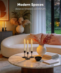6 Pack Wax Flameless Taper Candles With Remote Timer And Dimmer, Ivory LED Candle Sticks on modern living room table