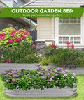 Two Pack Metal Raised Garden Bed 4x2x1ft Galvanized Planter Box For Backyard Veggies And Flowers Open Bottom Drainage Design Corrosion Resistant Lead Free Herb Garden Bed For Patios And Yards in a yard filled with colorful flowers