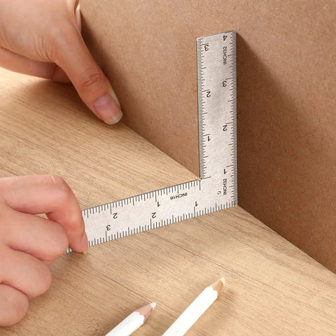 Real Deal Stainless Steel L Square Framing Ruler 4 By 6 Inch 90 Degree Layout Tool used for precise measurements on wood.