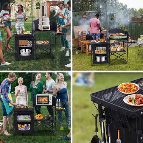 All In One Camping Kitchen Station With Light Stand And Windshield Portable Foldable Grill Table And Cook Station Picnic Table For Beach And Outdoors Includes Organizers And Carry Bag Black in use at an outdoor gathering.