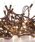 Clear Mini Christmas String Lights On Brown Wire Cord For A Cozy Festive Vibe, UL Approved For Indoor Outdoor Use, tangled view