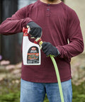 Person using BugClear Insect Killer For Lawns And Landscapes Ready To Spray Kills 235 Bugs In Minutes Rids Your Yard Of Pesky Mosquitoes Ticks Ants Spiders Fleas Cicadas And More 32 Oz 2 Pack in garden