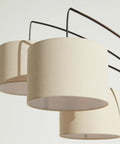 Three fabric shades of Trilage Arc Floor Lamp with LED bulbs, multi-head tree style in oil rubbed bronze.