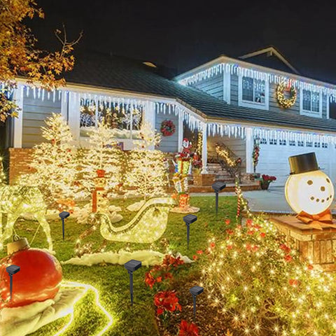Decorated house with 80 Ft Solar Powered Fairy Lights Outdoor Waterproof Silver Wire With 240 LEDs 8 Modes Two Pack Warm White Glow