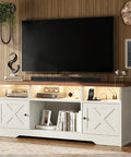 65 Inch TV Stand With Built In Power Outlet And LED Lights Cool Farmhouse White Entertainment Center With Cable Management Storage Cabinets Console Table For Living Room And Bedroom Media Furniture in a modern living room setup.