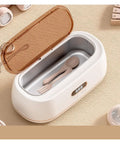 Slick Mini Ultrasonic Cleaner Doing Heavy Lifting For Jewelry And Eyewear Washing Machine Zero Sweat Compact Home Care Kit That Crushes Stubborn Buildup Grime Quickly with cutlery inside